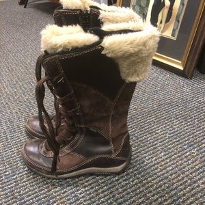 Winter brown Merrell boots. Fur around top